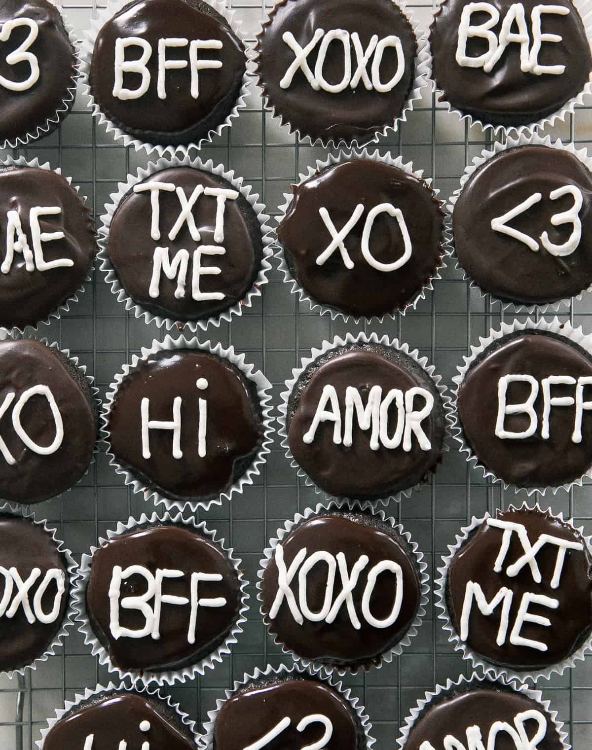 Conversation Cupcakes with cute phrases written on top. 