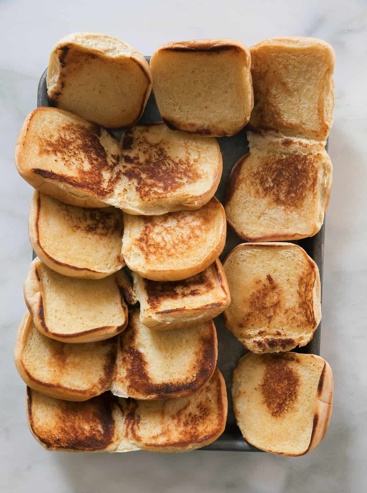 Buns that are toasted in a pan.