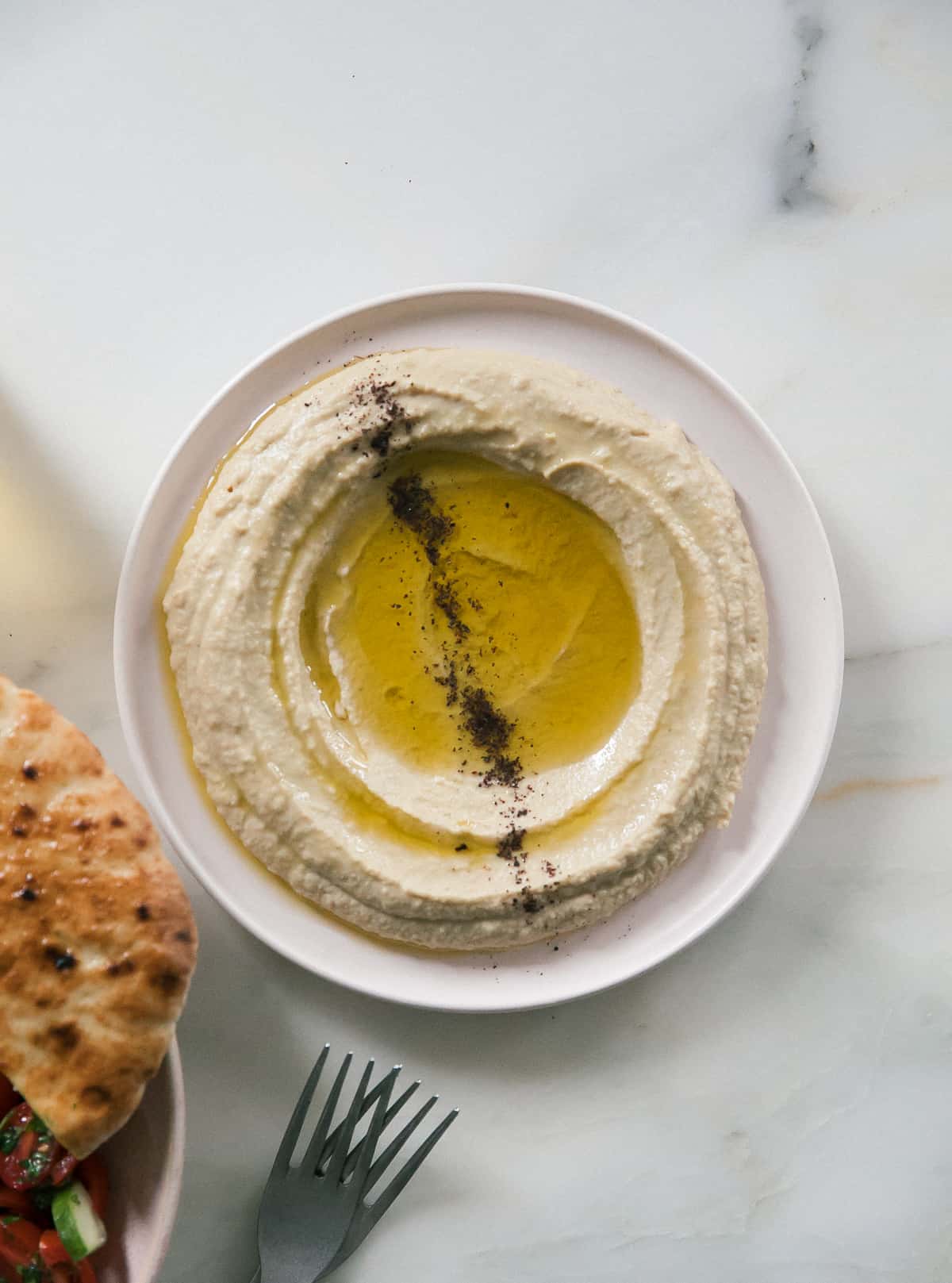 Hummus on a plate. 