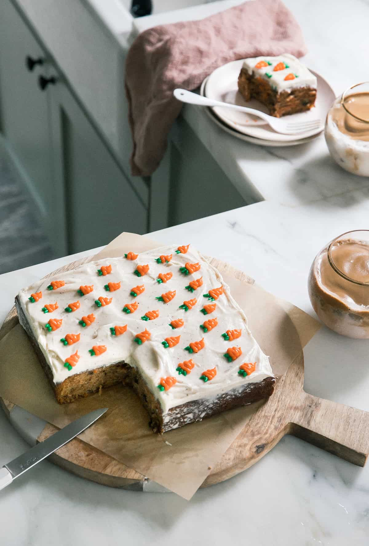 Mini Carrot Cake with Brown Butter Cream Cheese Frosting on a cutting board
