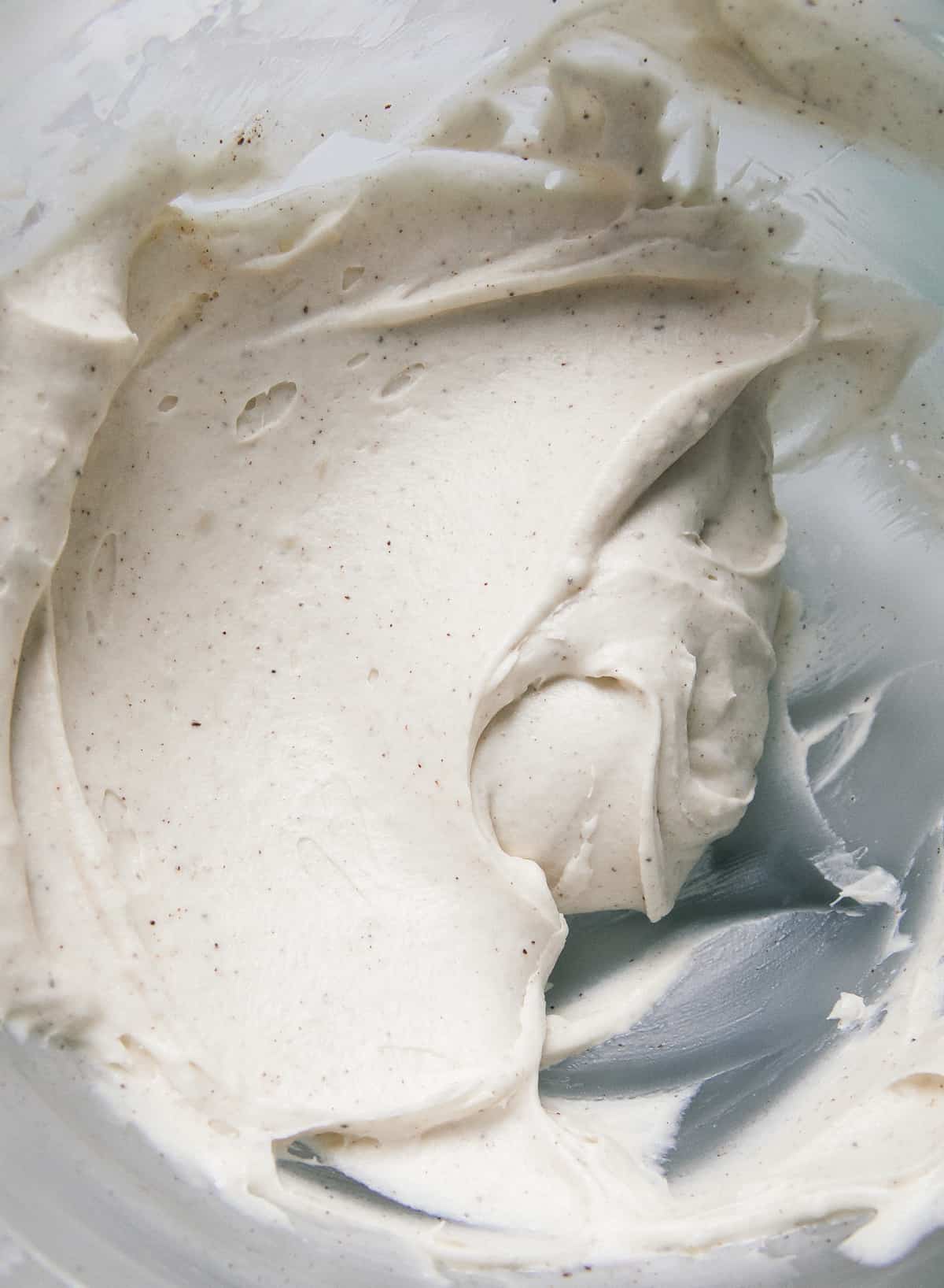 Brown butter cream cheese frosting in a bowl. 