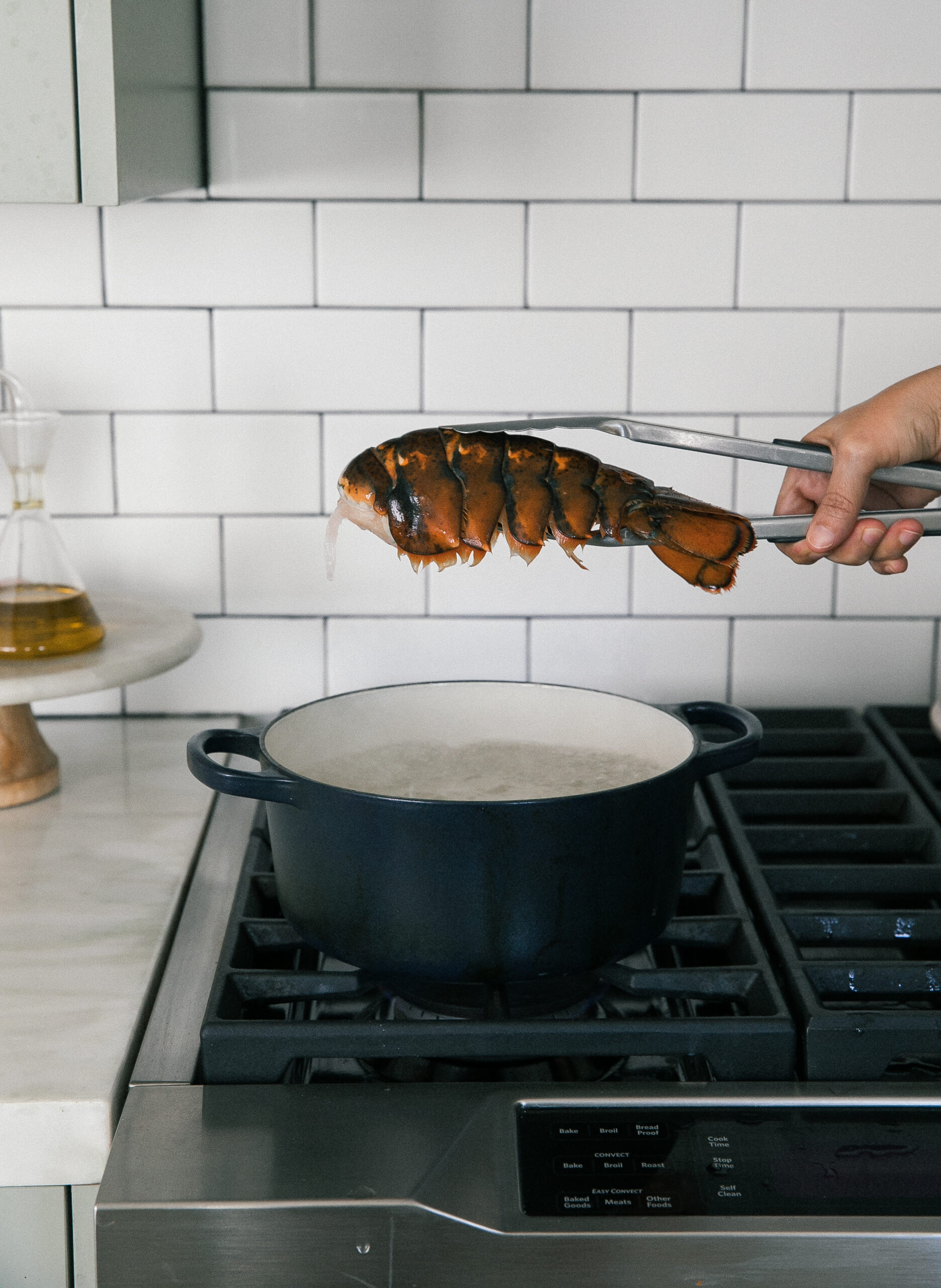 Lobster Tail being lowered in water