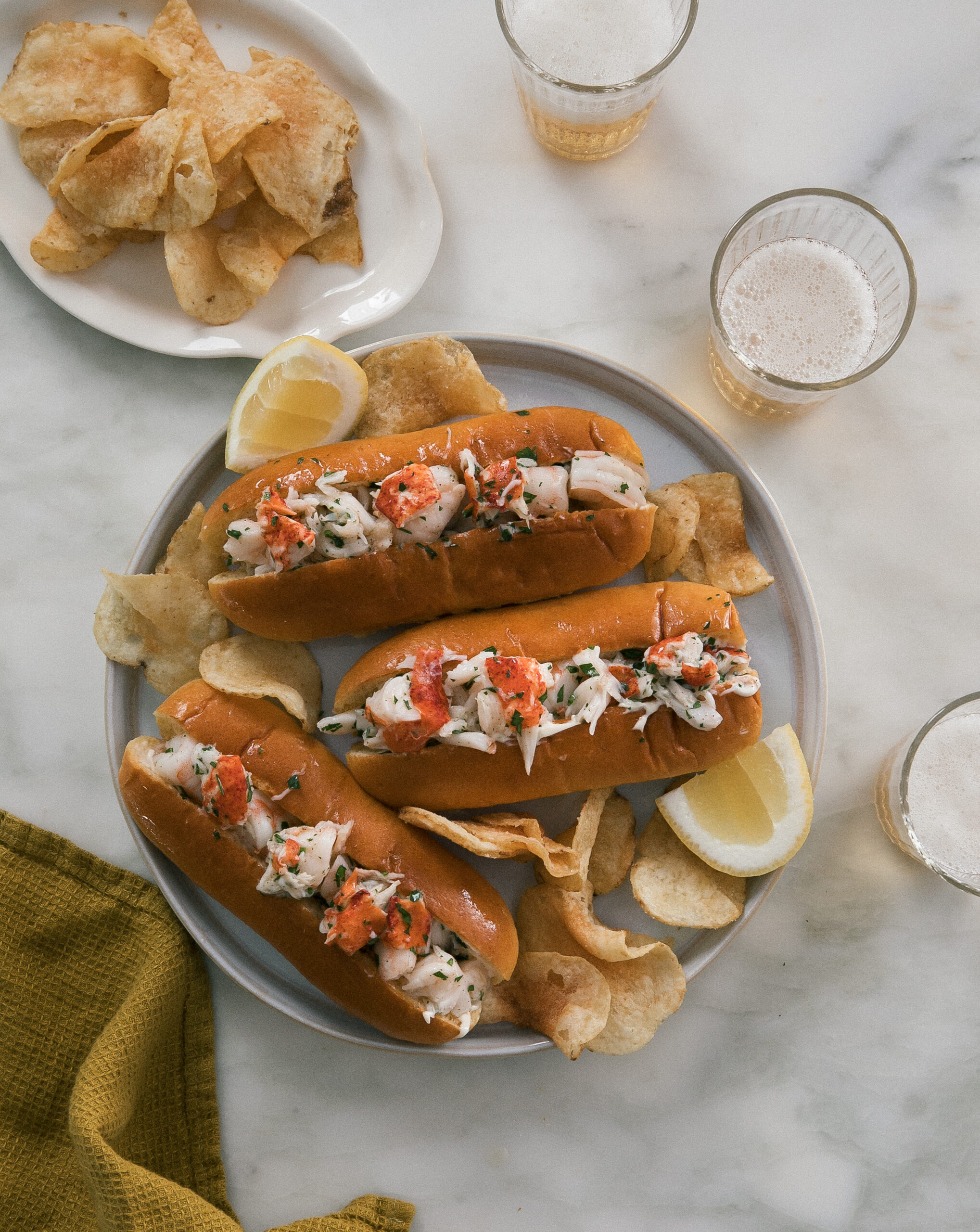 Seafood Rolls on a plate with chips