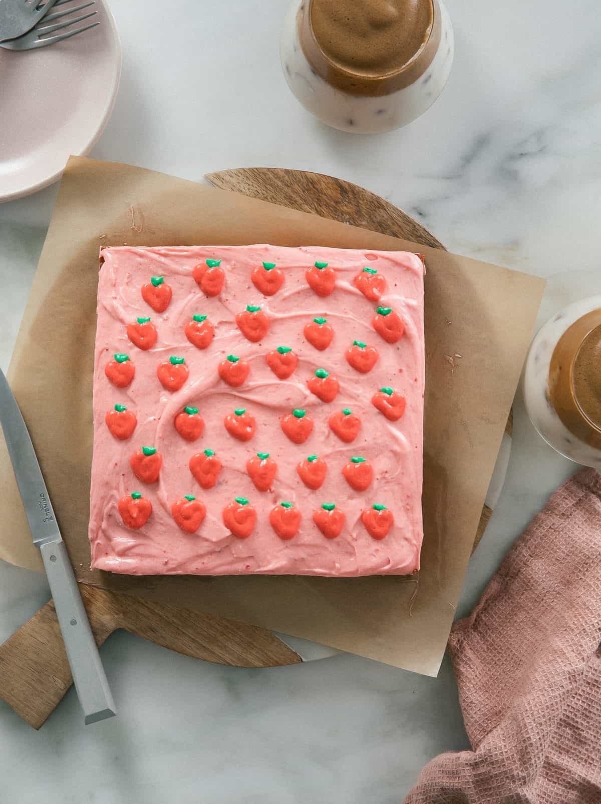 square strawberry cake with strawberries on top