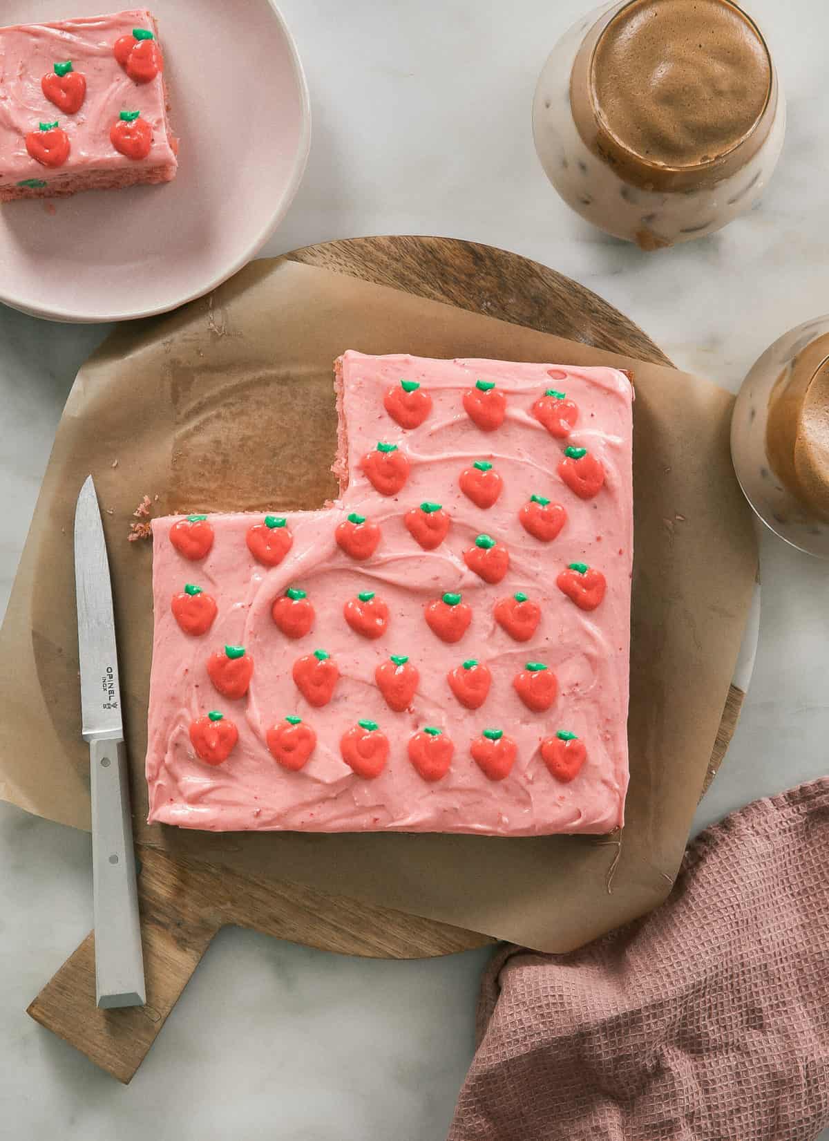 square strawberry cake with strawberries on top