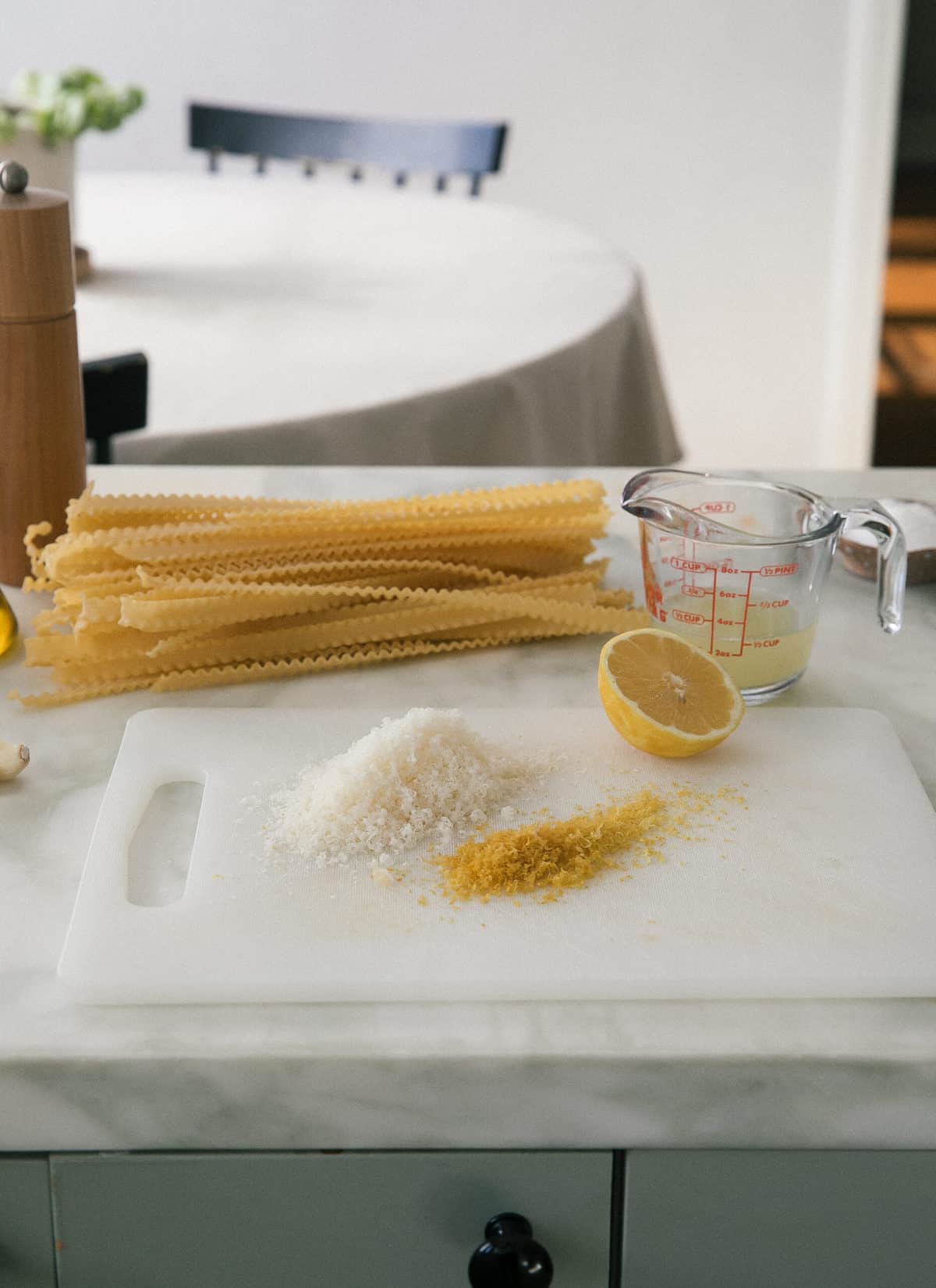 Zest and cheese grated on a cutting board