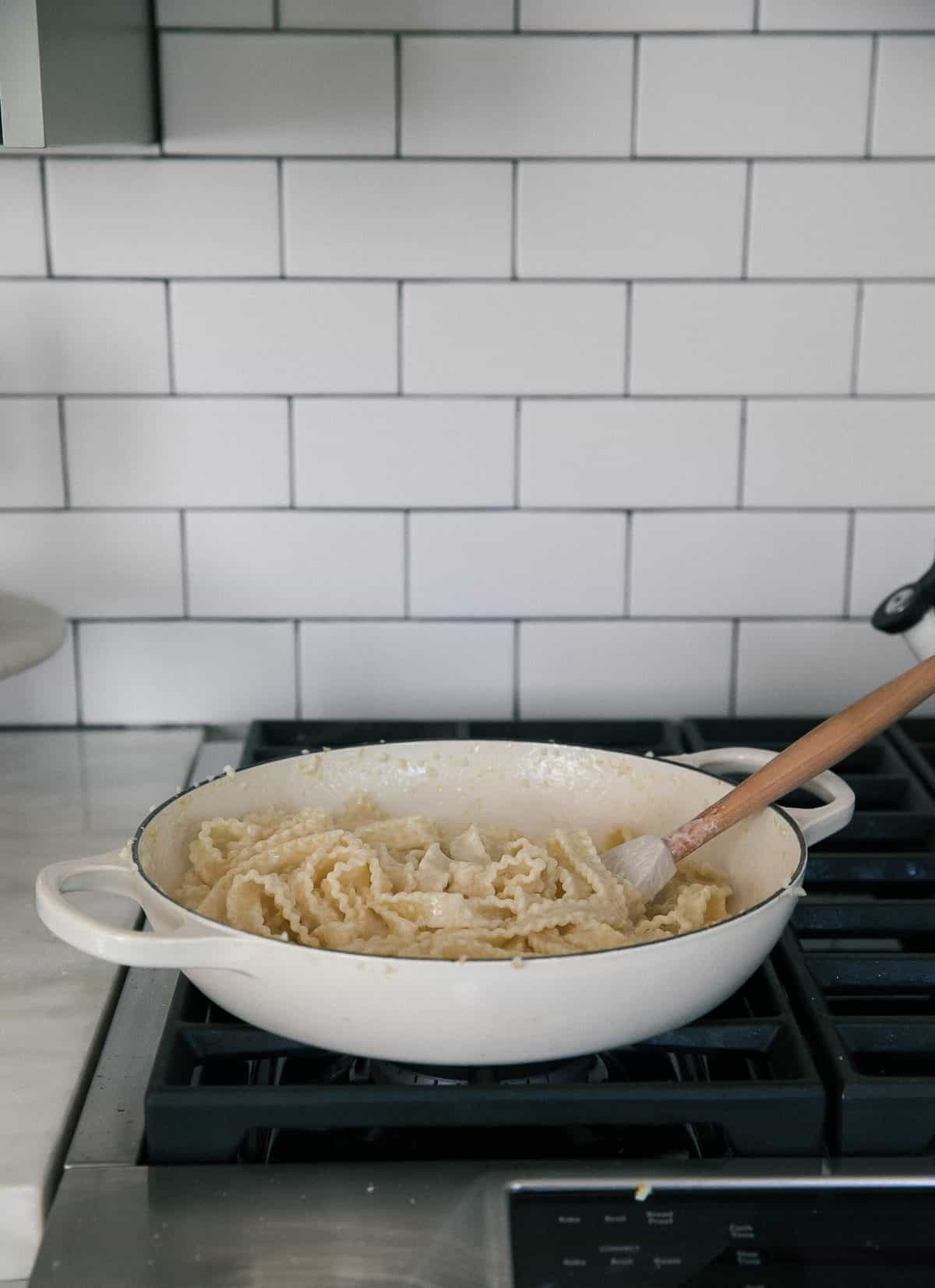 Pasta cooking in pan. 