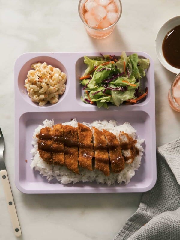 Overhead pork katsu on plate with mac salad and salad