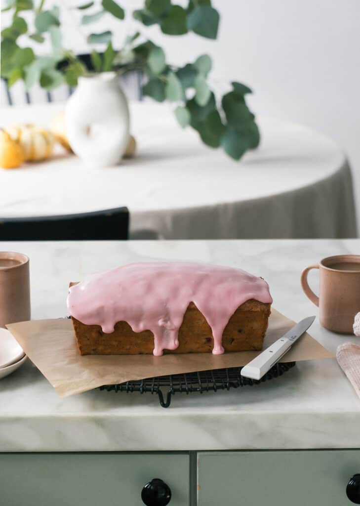 Cranberry Cake on counter with drip