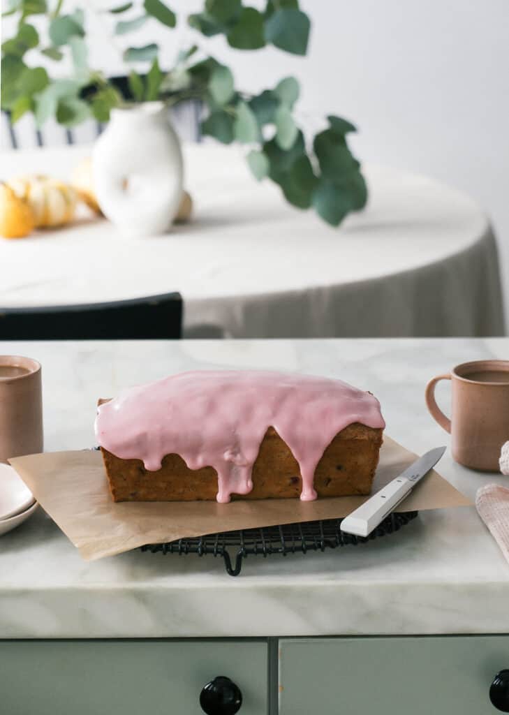 Cranberry Cake on counter with drip.