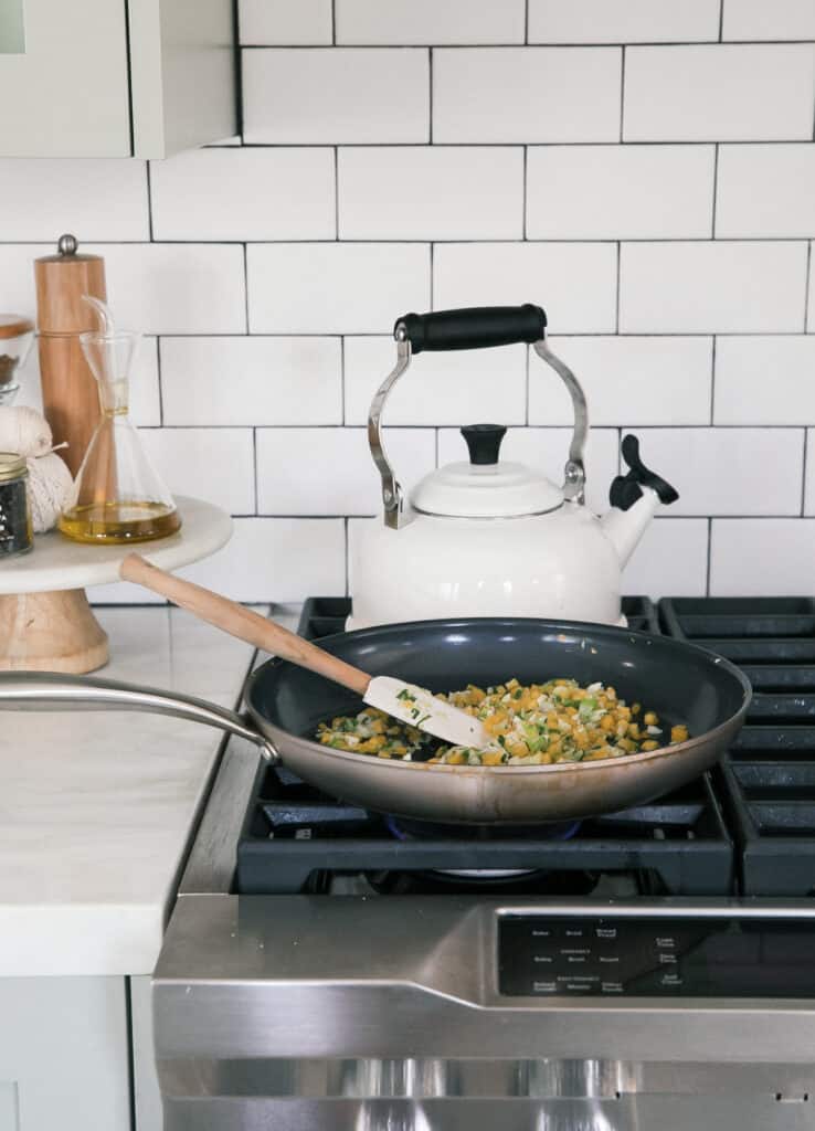 Filling being cooked down in a skillet
