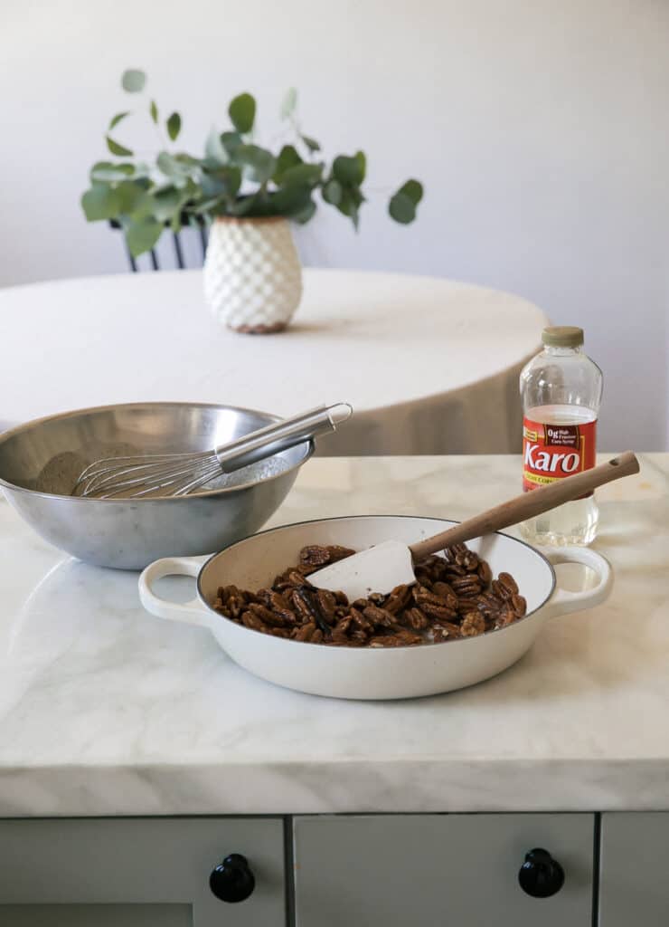 Toasted pecans in a pan. 