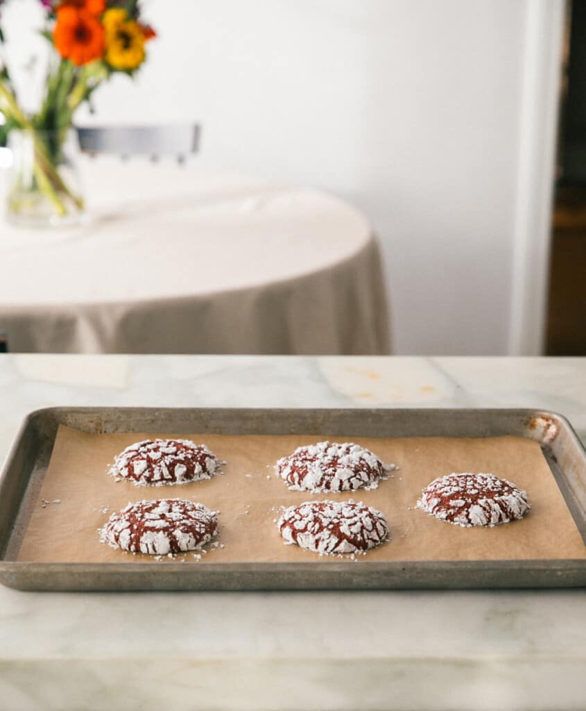 Red Velvet Crinkle Cookies on Baking Sheet