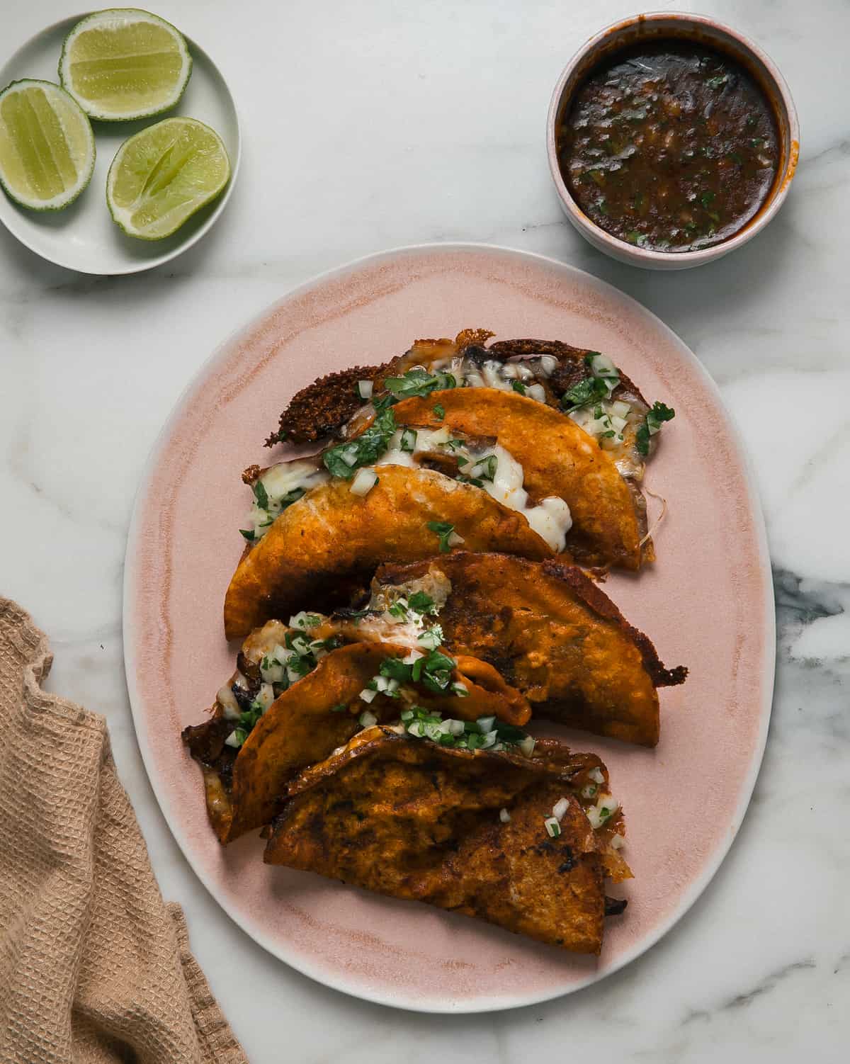 Birria Tacos on plate overhead