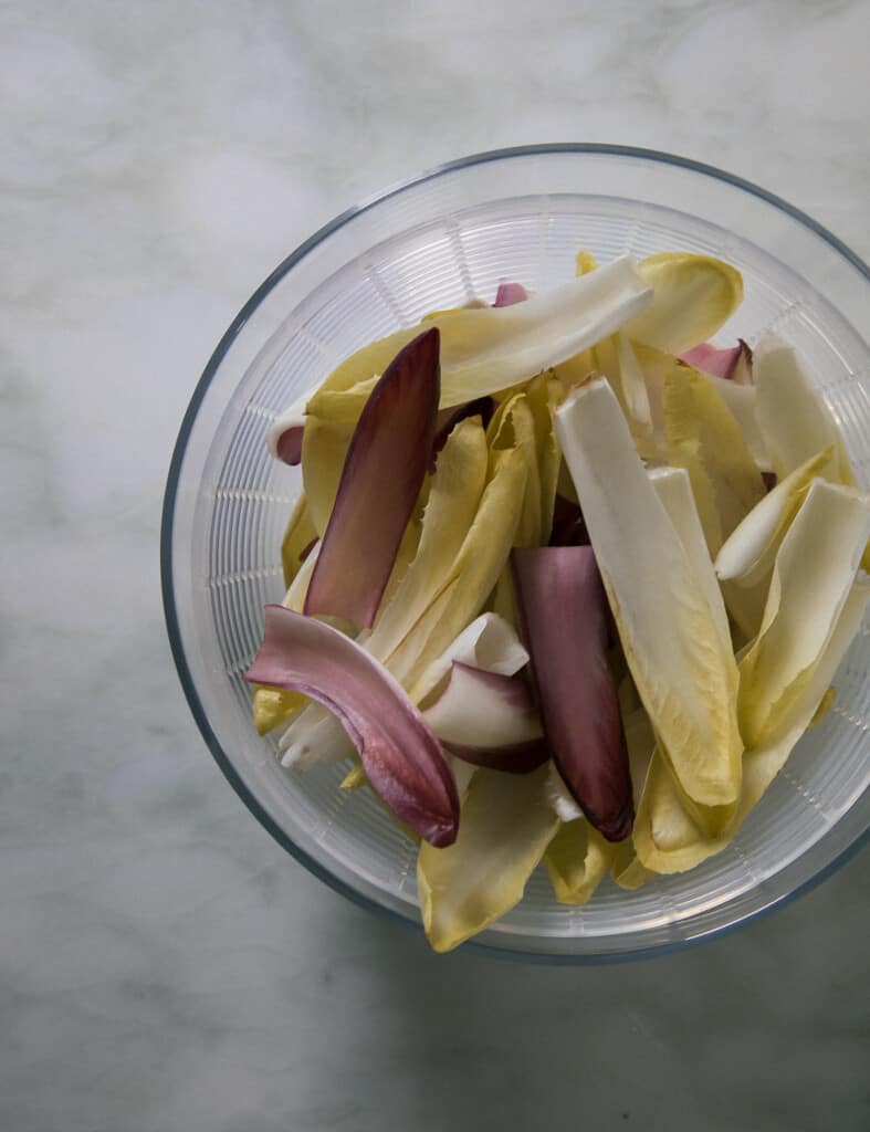 Endive leaves in salad spinner