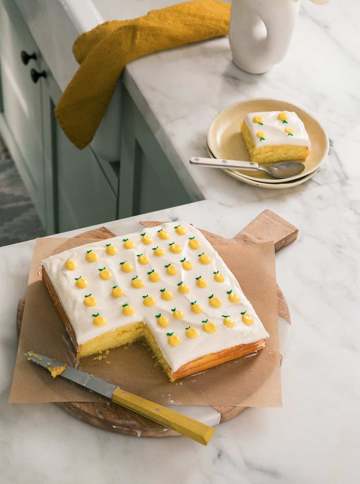 Lemon Cake on Cutting board by sink