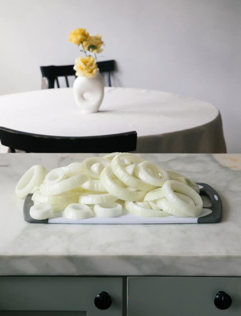 Vidalia Onion Slices on Cutting Board