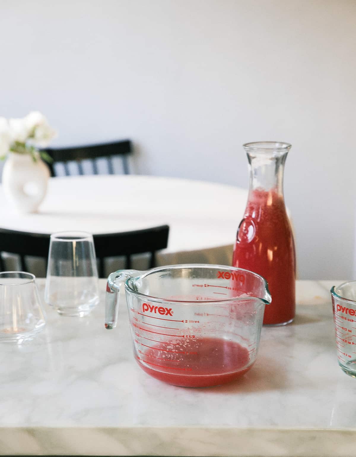 Watermelon puree on counter.