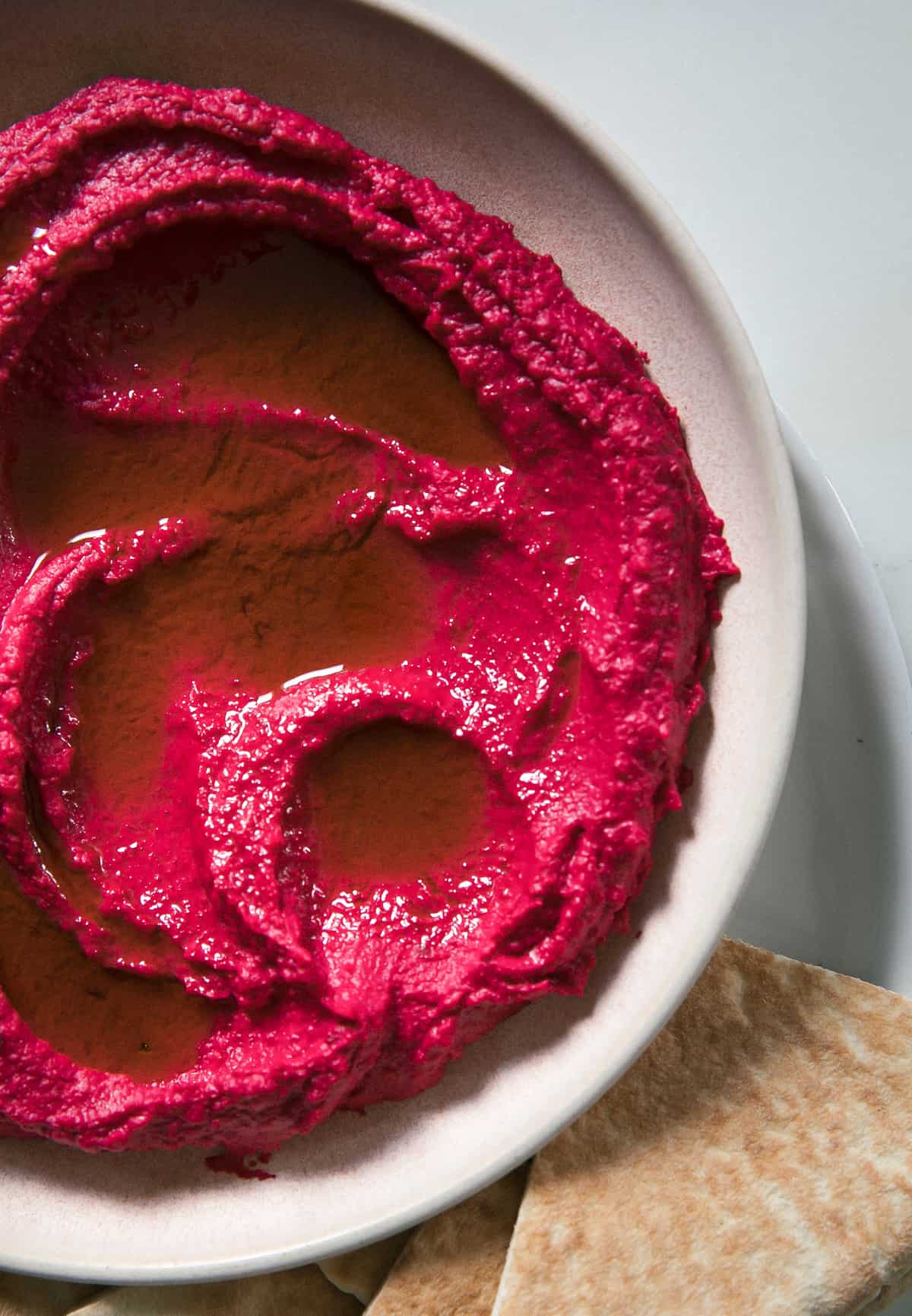 Beet Hummus in bowl. 