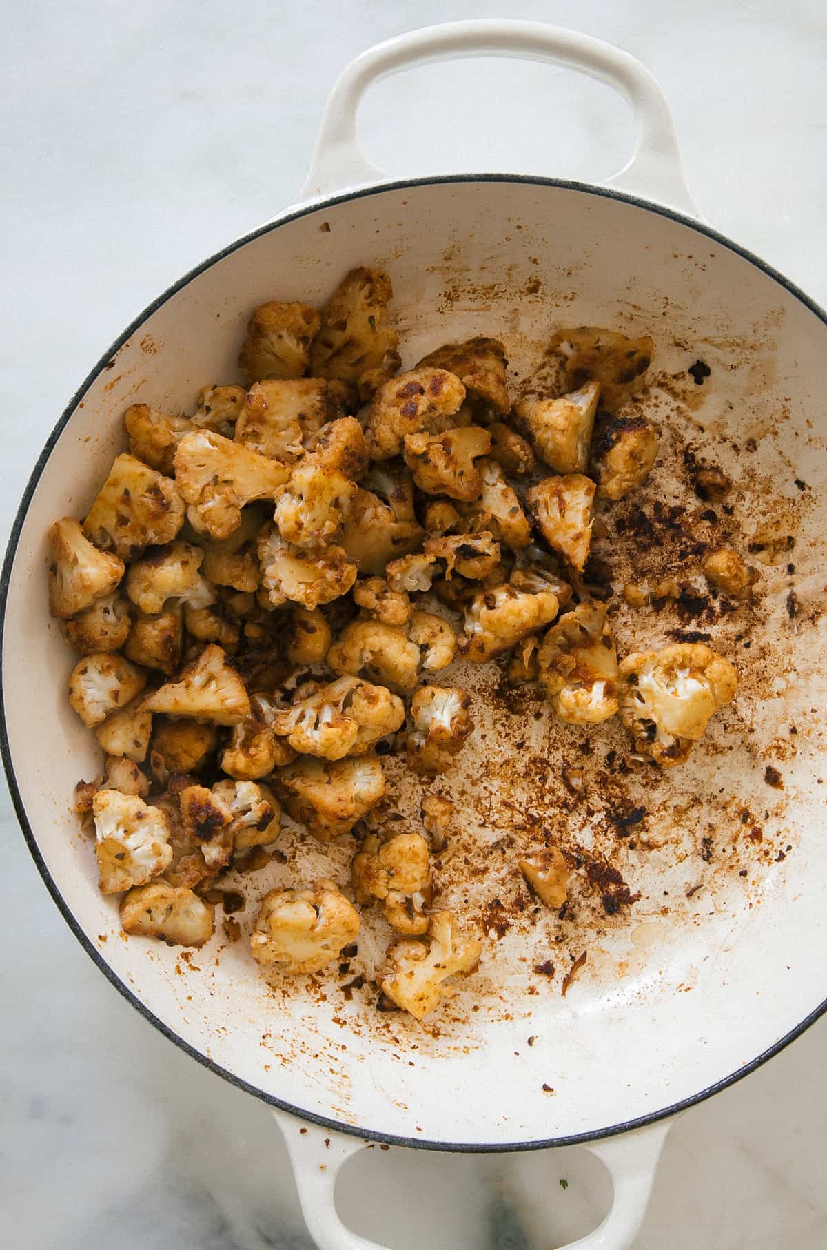 Cauliflower cooked in a pan. 