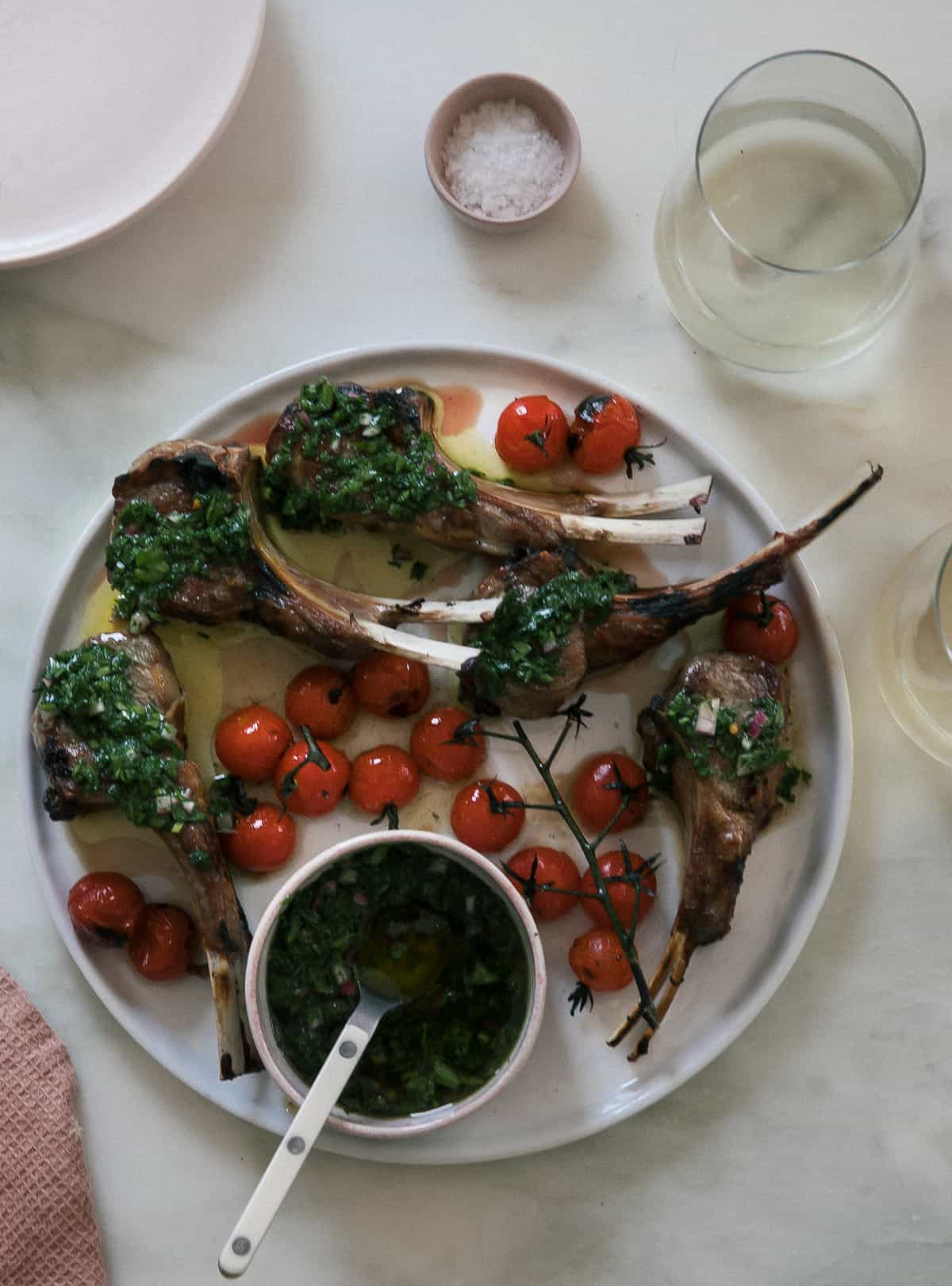 Grilled Lamb Chops with Chimichurri on a plate. 