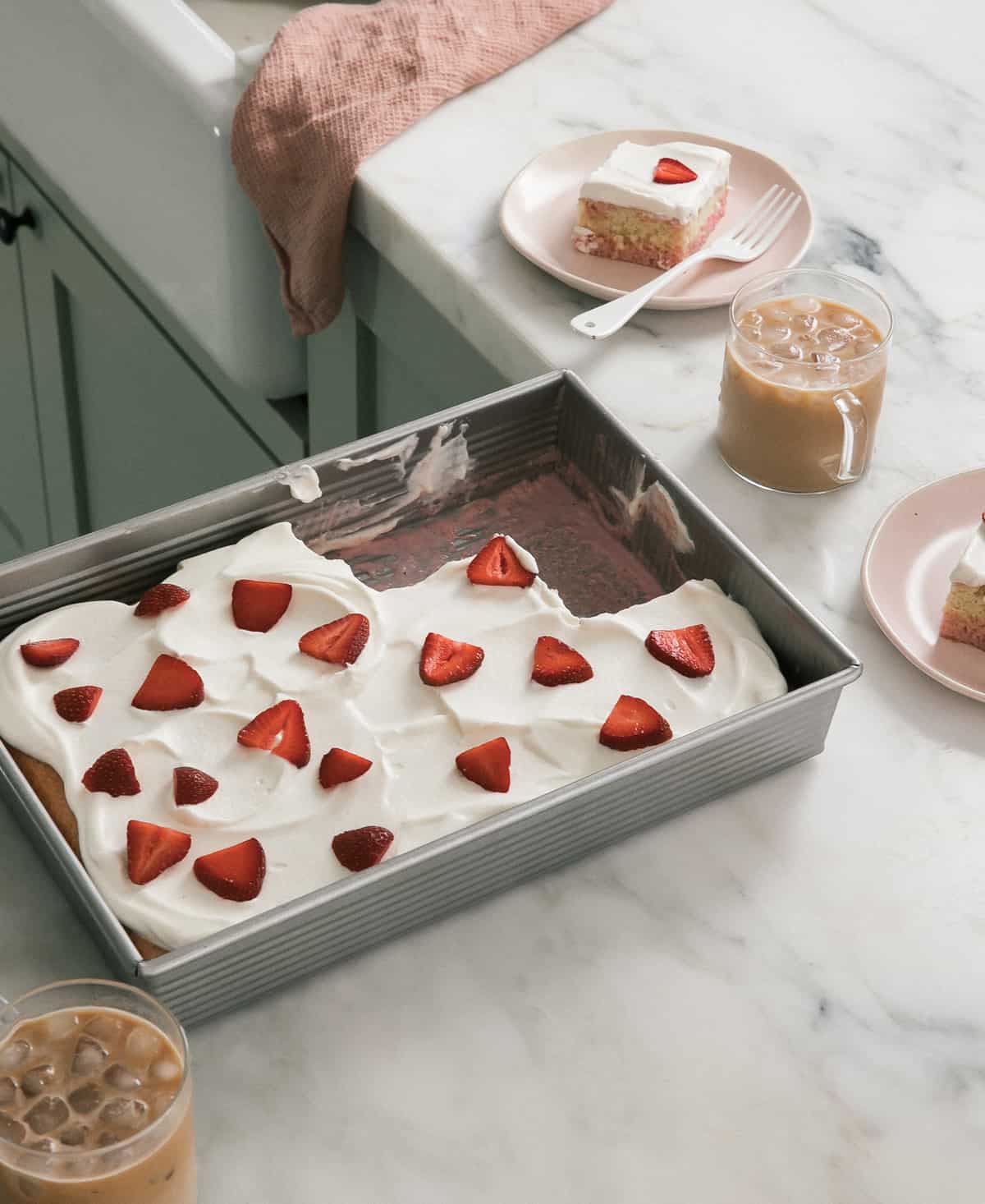 Strawberry Tres Leches Cake on counter. 