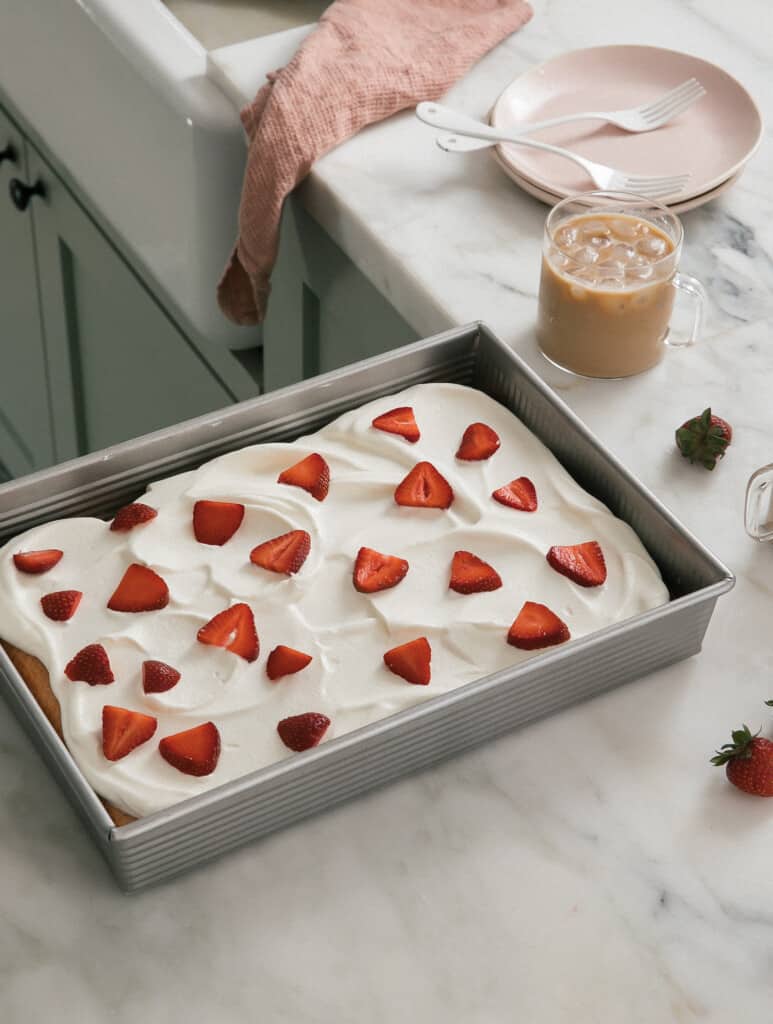 Strawberry Tres Leches Cake on counter