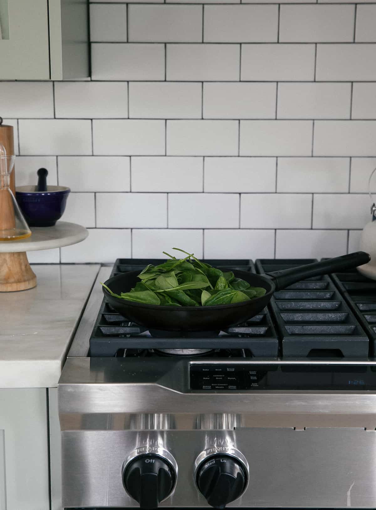 Spinach being sauteed