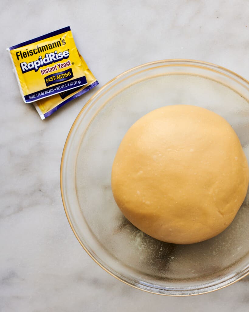 Dough that is rising in a bowl. 