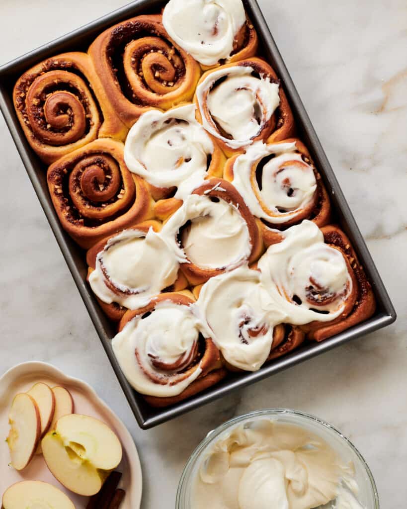 Apple cinnamon rolls in a pan. 