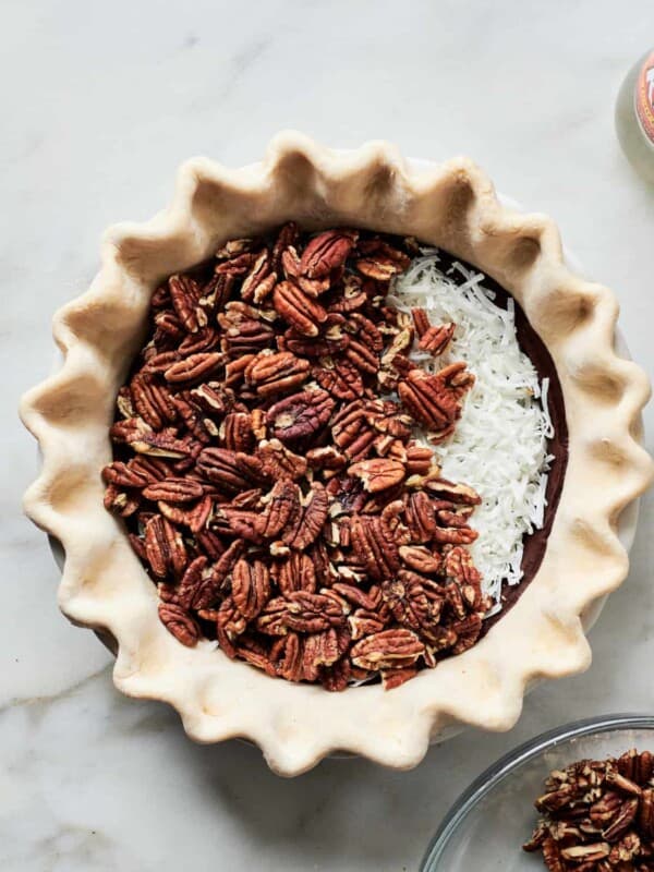 Layering Filling in Chocolate Coconut Pecan Pie