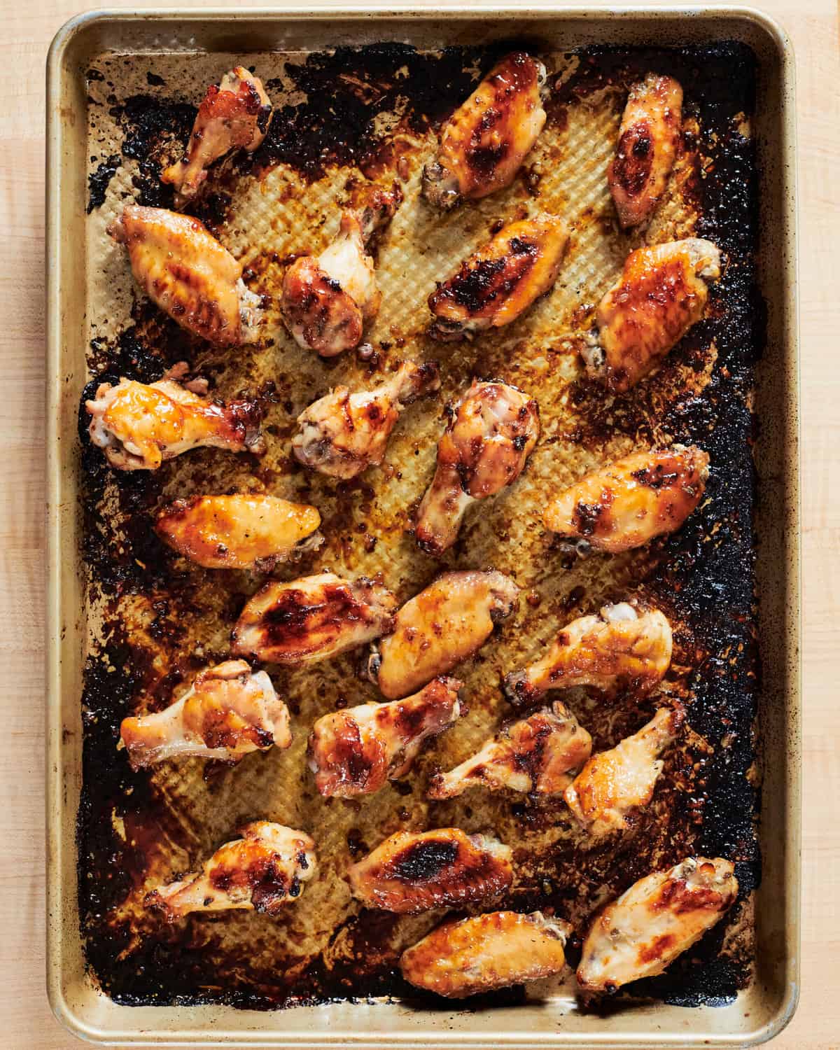 Wings on a baking sheet. 