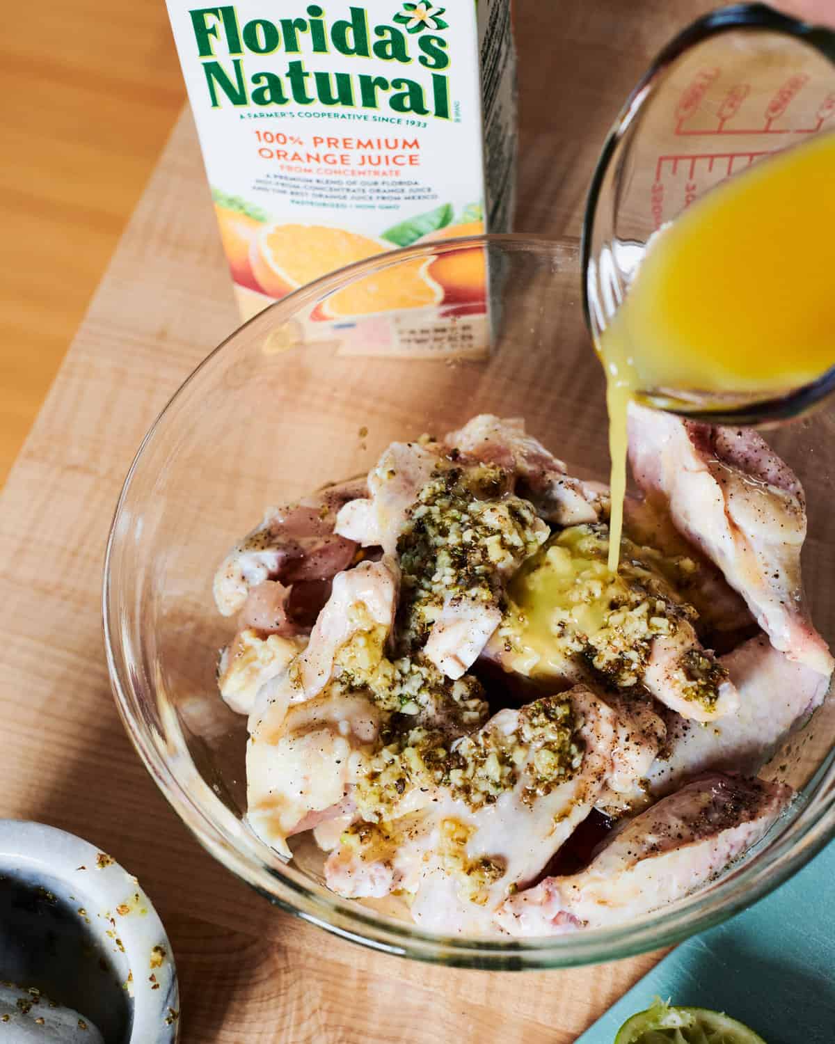 Pouring Florida's Natural Orange Juice into Bowl