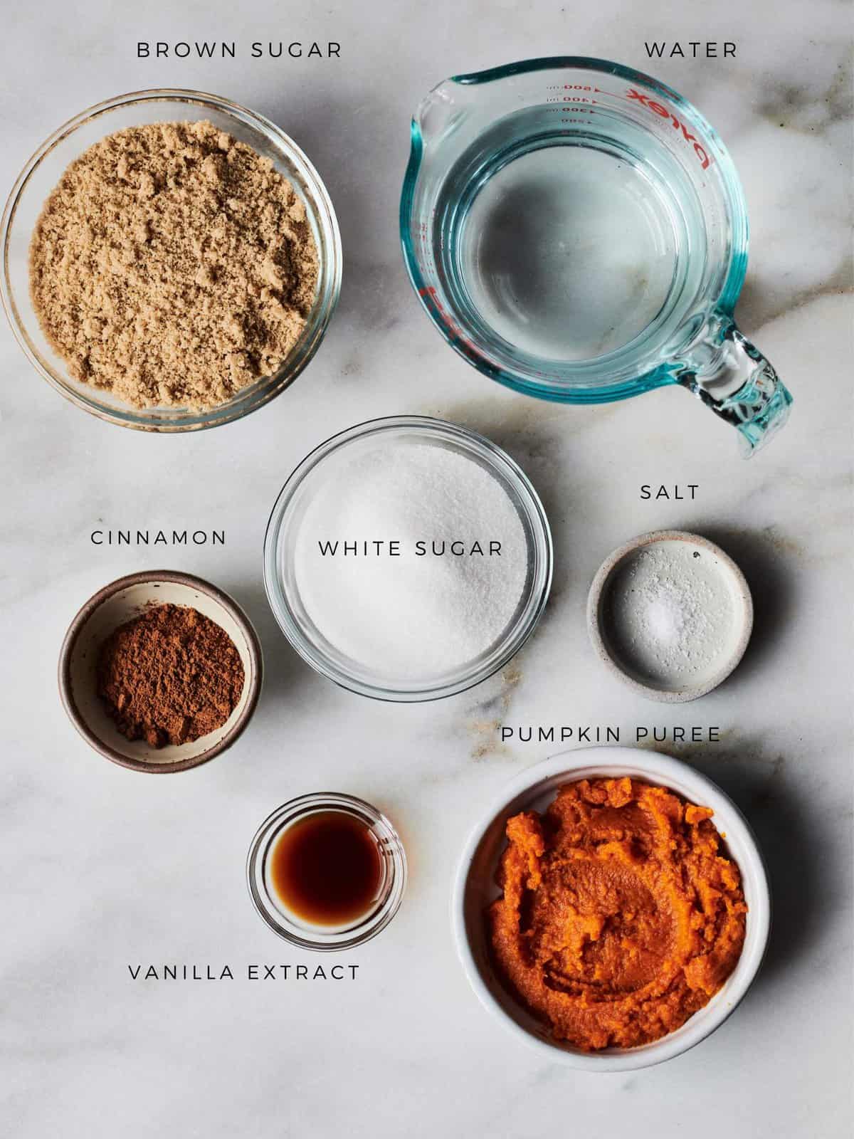 Ingredients in bowls for Iced Pumpkin Spice Latte