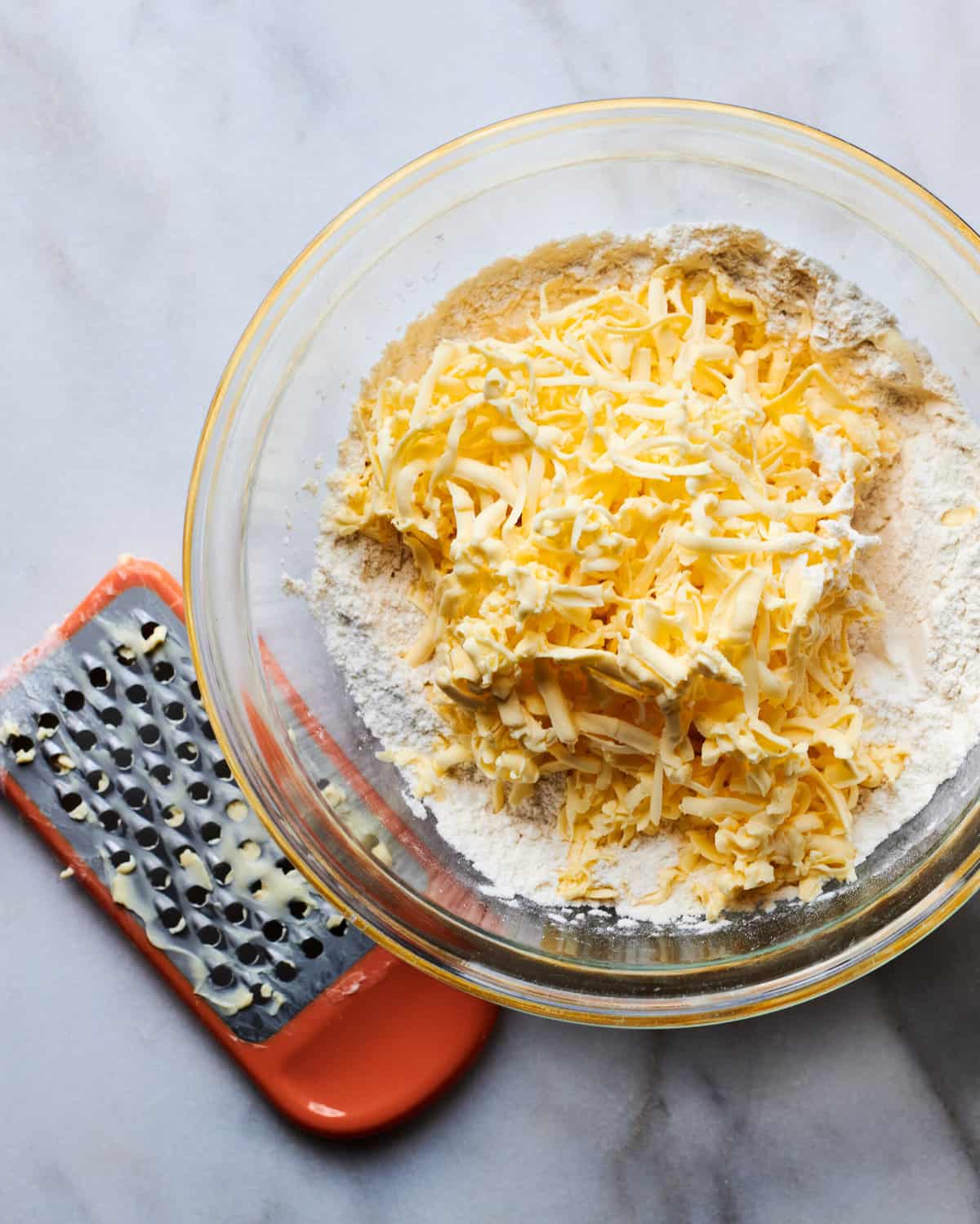 Butter grated in bowl. 