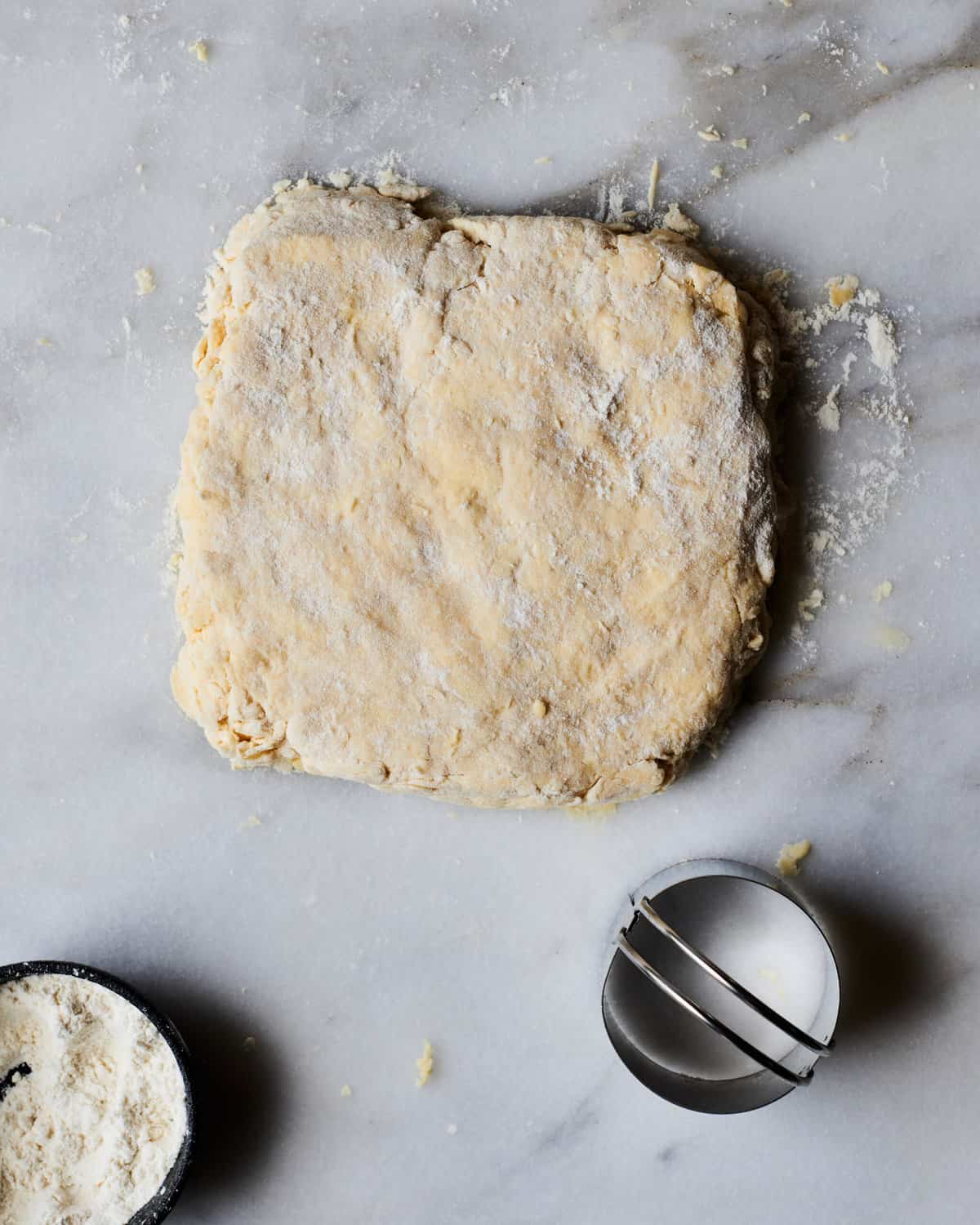 Biscuit dough on counter. 