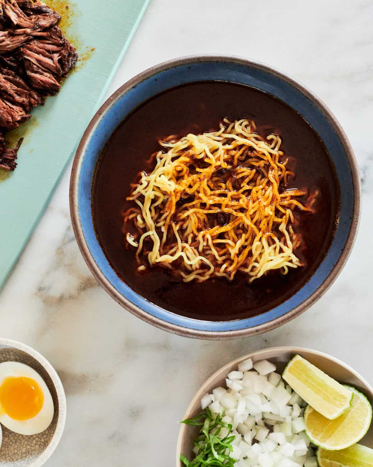 Ramen Noodles in Birria Broth.