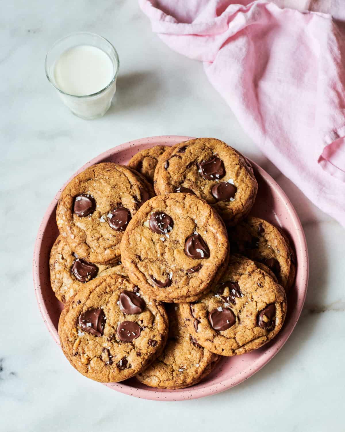 Brown butter chocolate chip cookies on a platter.