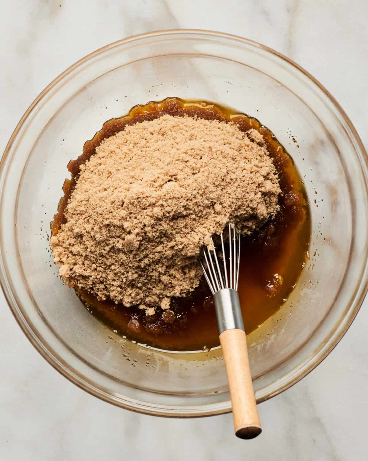 Brown butter and sugars being combined. 