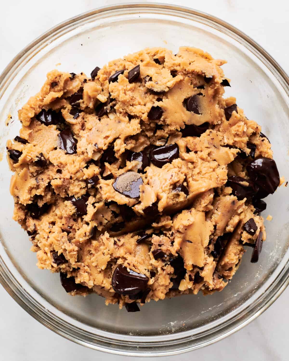 Brown butter chocolate chip cookie dough in a bowl. 