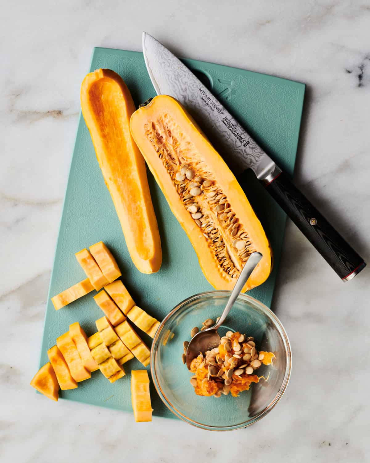 Squash being chopped up. 