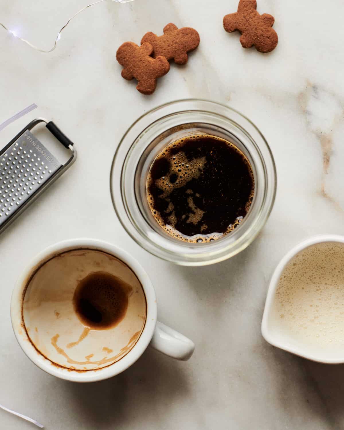 Gingerbread syrup being combined with espresso. 