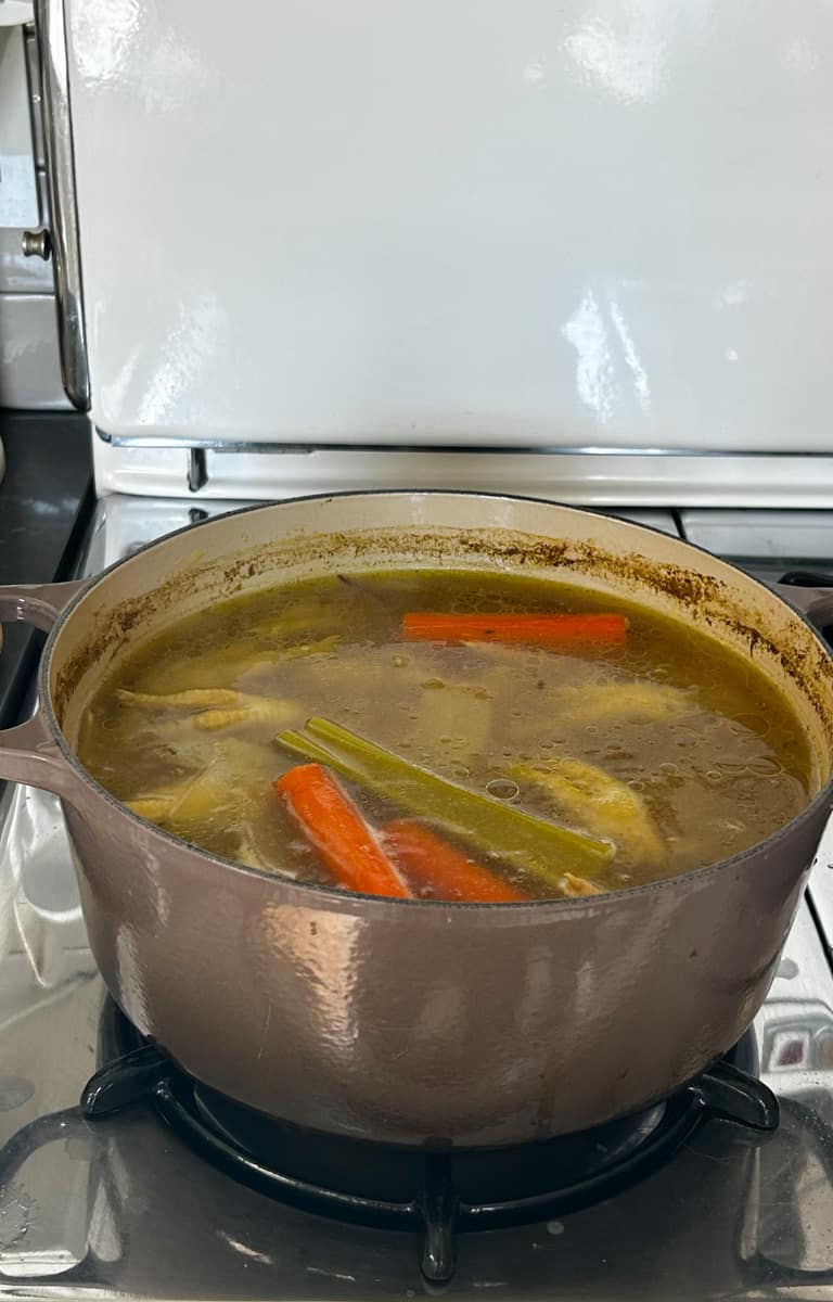 Chicken stock simmering on the stove after it's all done. 