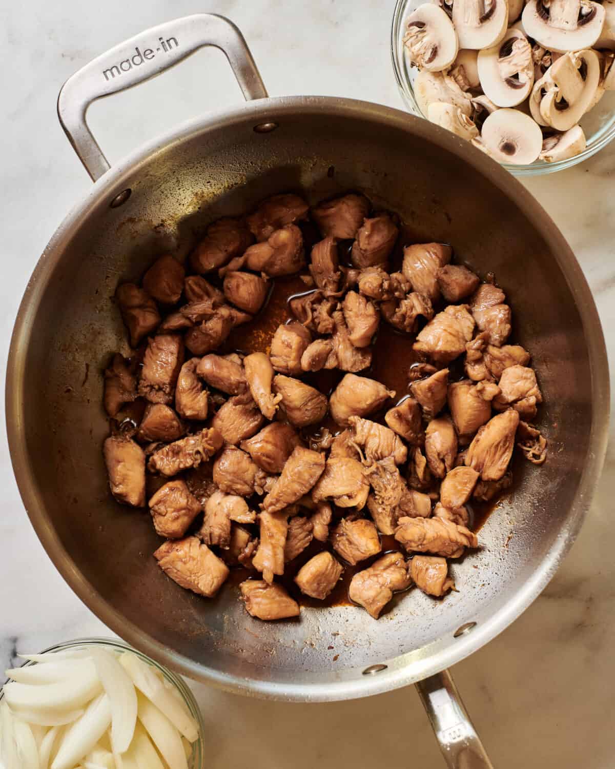 Chicken cooked in pan. 