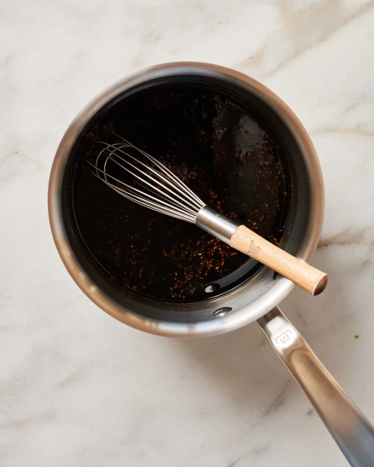 Homemade Teriyaki sauce thickening in pan. 