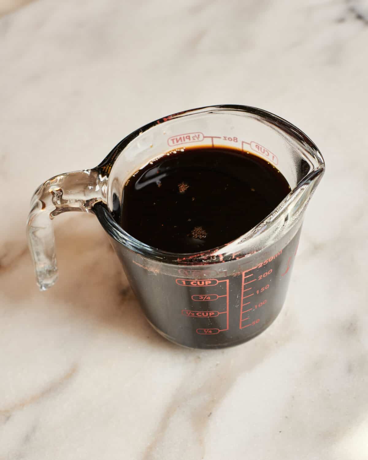 Teriyaki Sauce in measuring cup. 