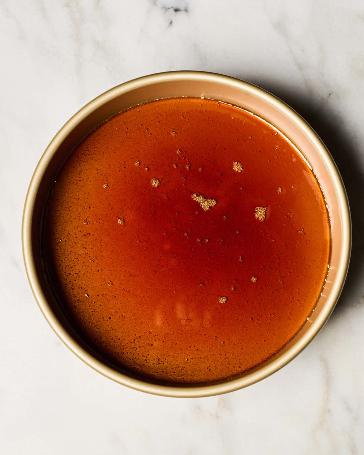 Caramel that's cooked in a pan. 