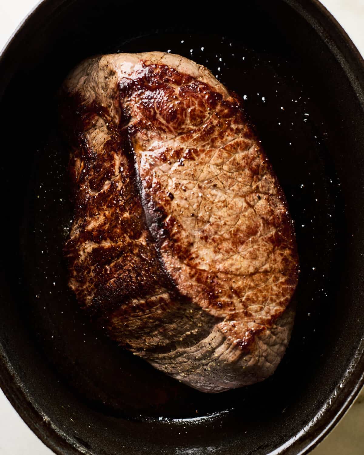 Pot Roast seared in a Dutch oven. 