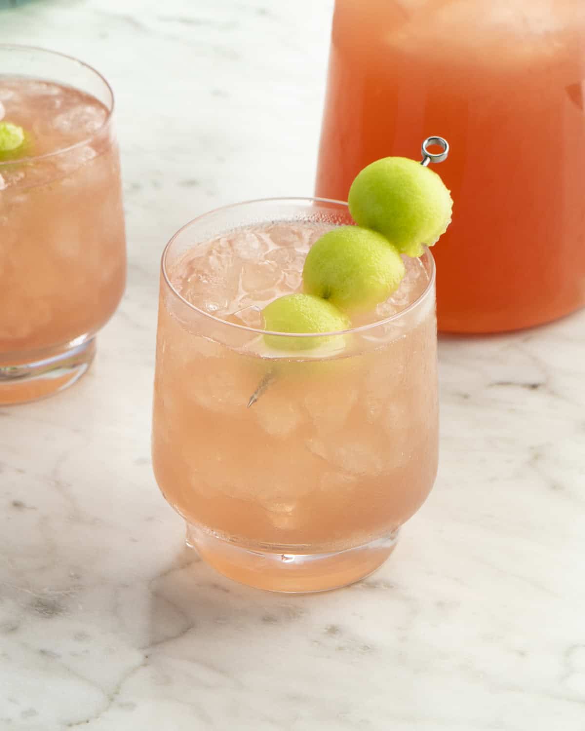 Honey Deuce Cocktail with honey dew melon balls.