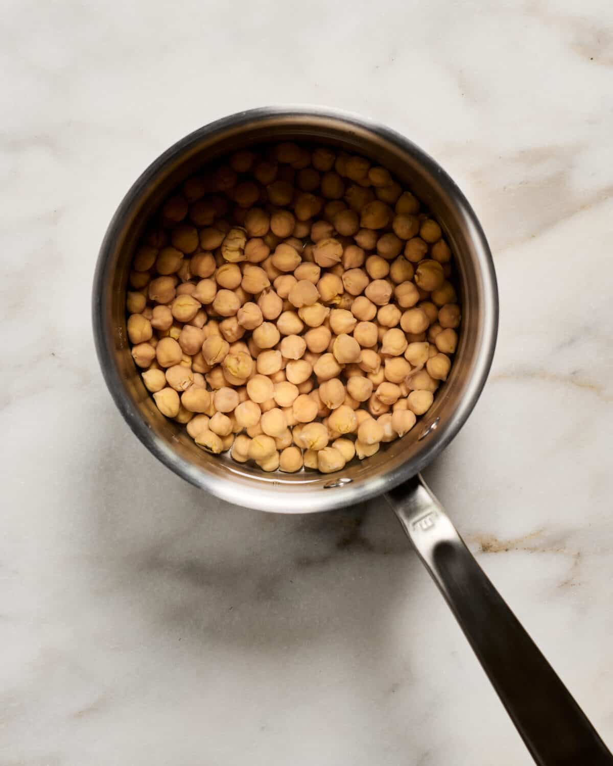 Cooking canned chickpeas.